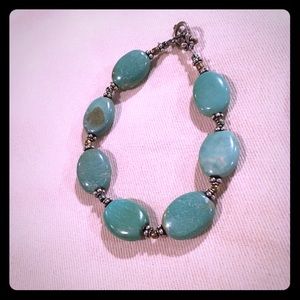Turquoise bracelet with beautiful loop hole clasp.