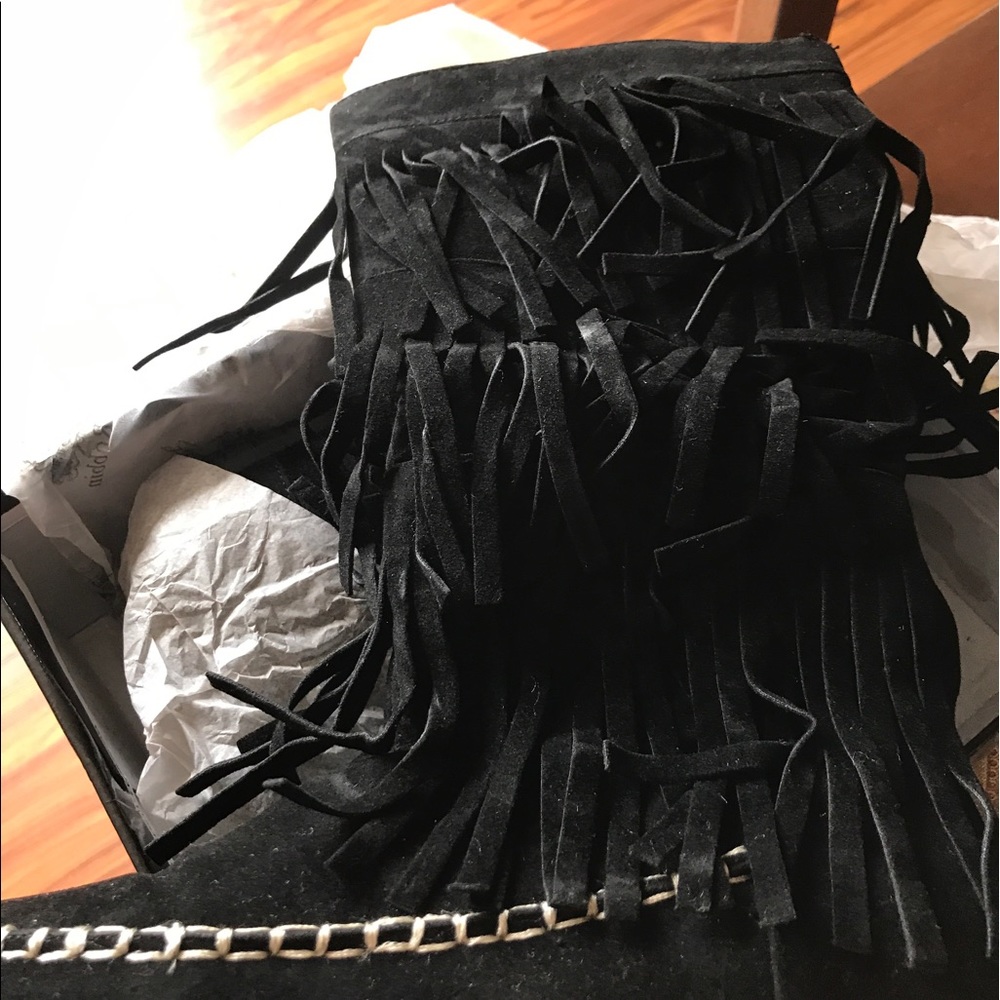 Size 7 black fringe boots new never on.