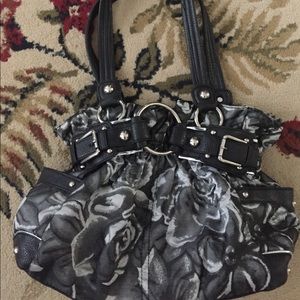 Purse made by wilsons leather. LOWEST price