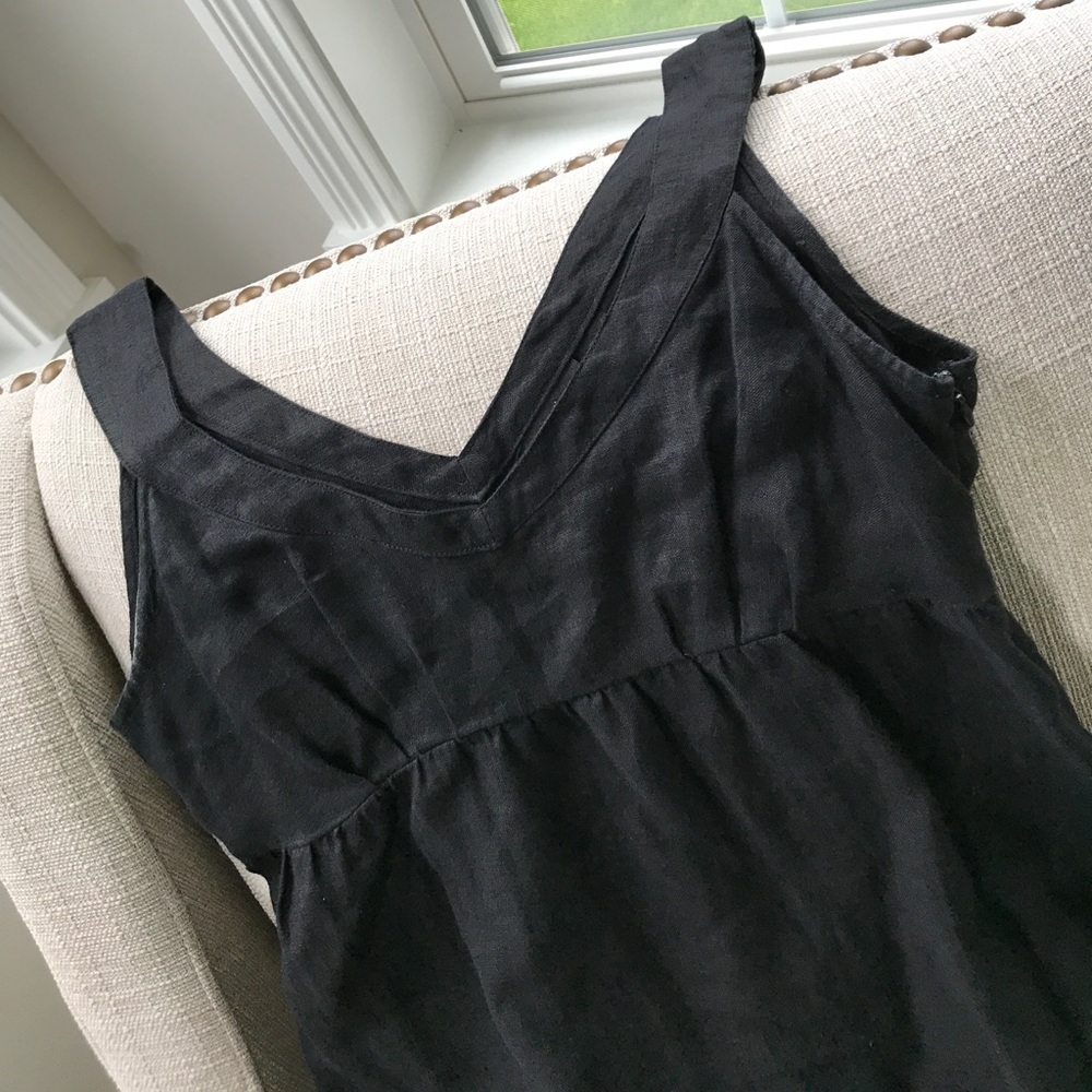 Black linen v neck dress with ruffle at bottom