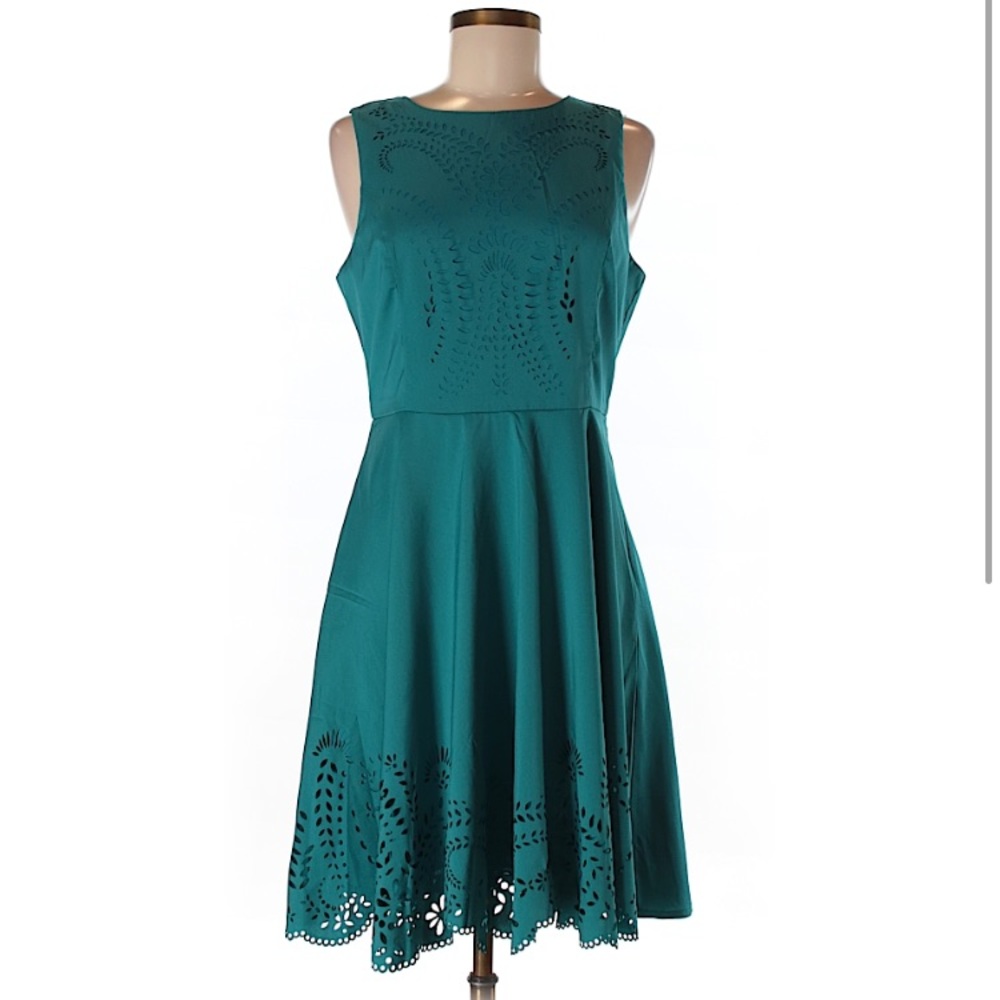 Teal dress with cut out detailing