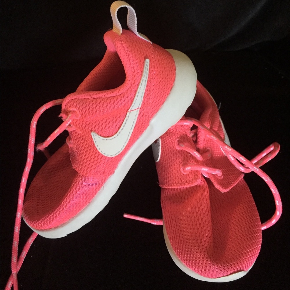 Hot pink toddler nikes.