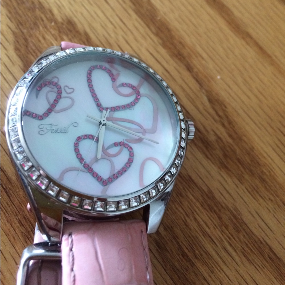 Heart, fossil watch with light pink band.