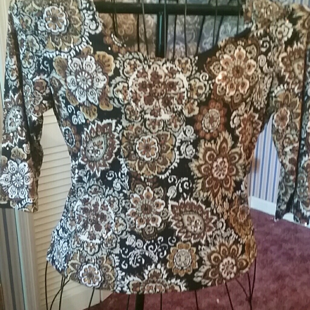 Dressy blouse , it's a large but fits like a med.