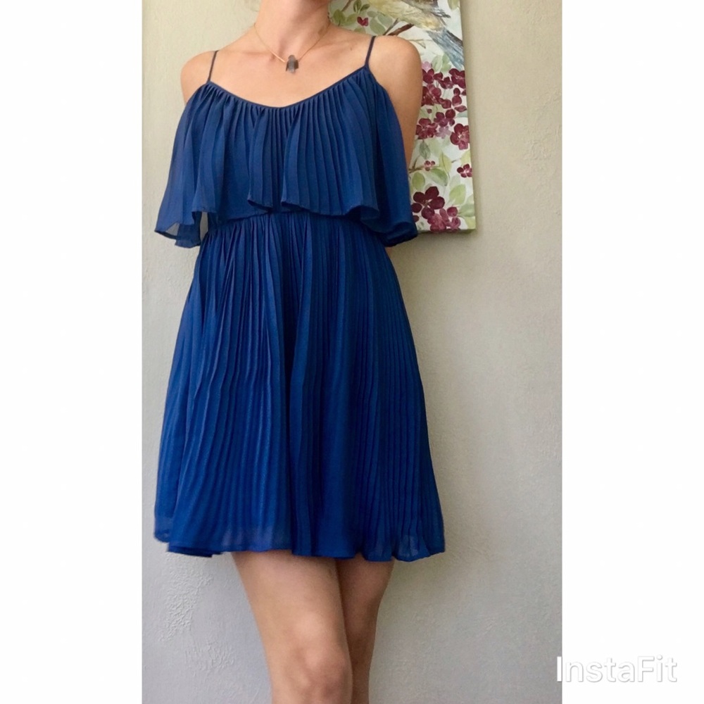 Fun and flirty royal blue pleated dress