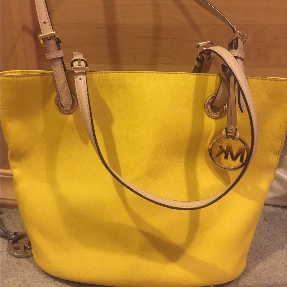 Yellow Michael Kors pocket book