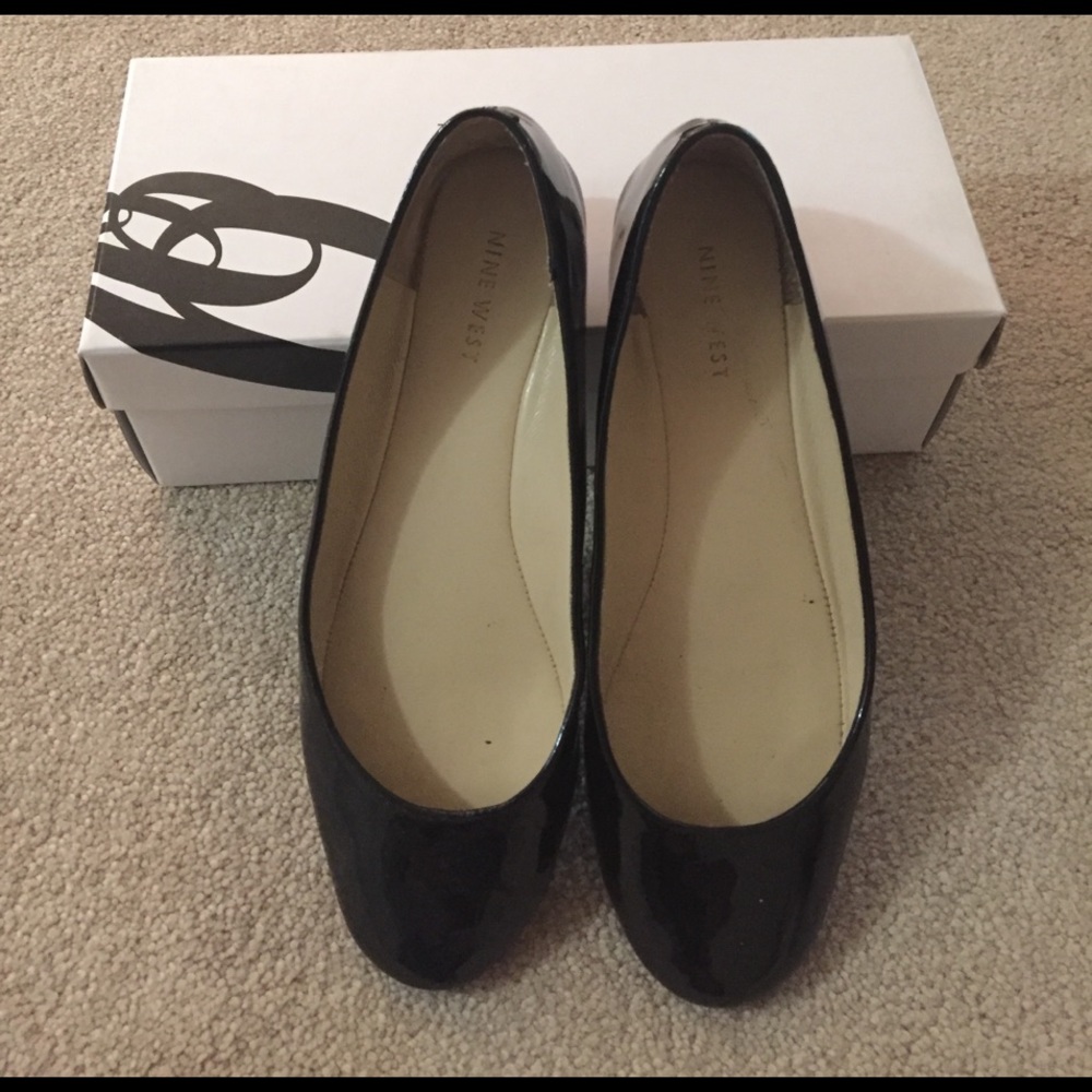 Nine West patent leather black flats, size 8.