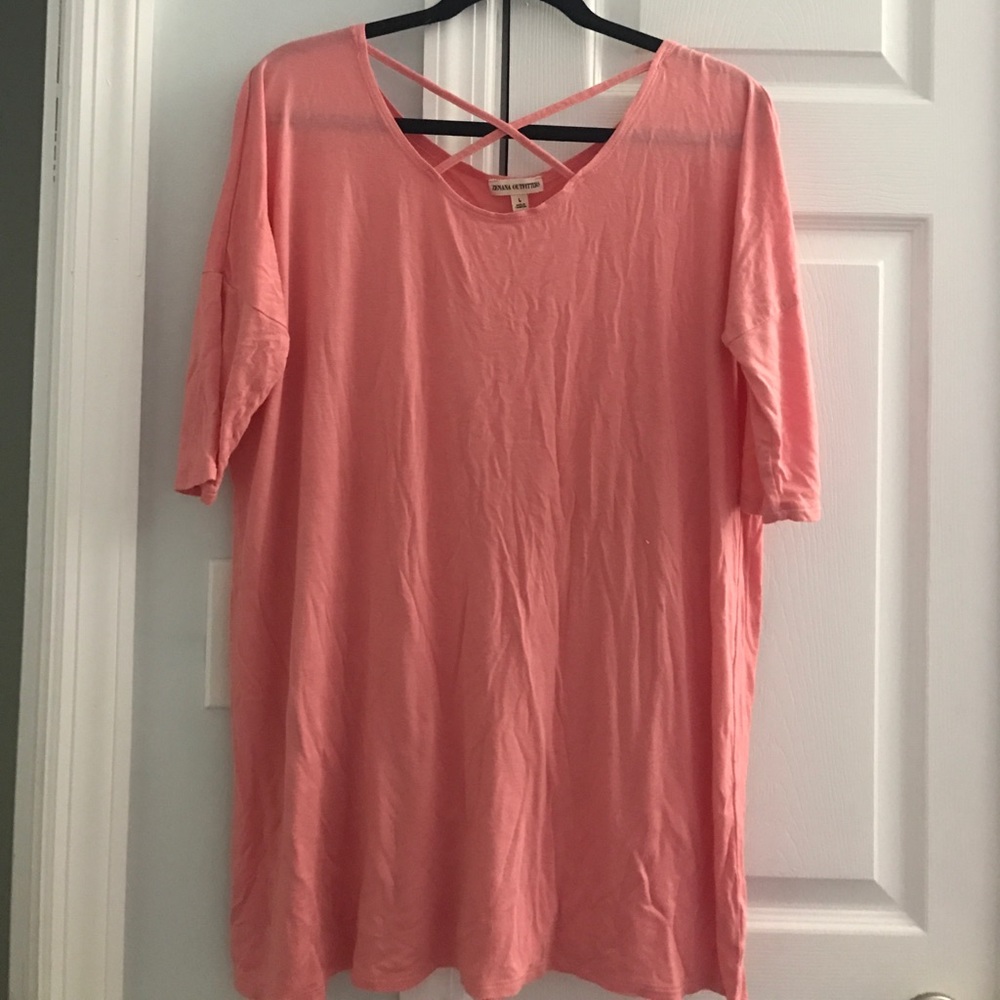 Pink flowy "piko-like" top