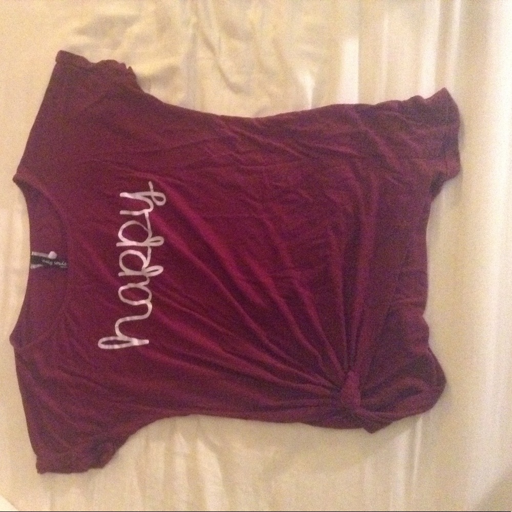 Small maroon Happy t shirt.