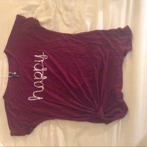 Small maroon Happy t shirt.