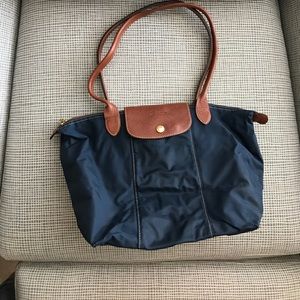 Navy Longchamp Bag with Navy Stripe.