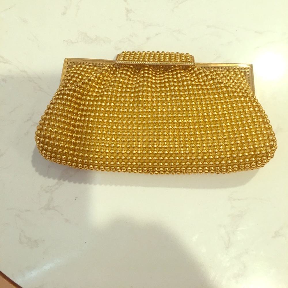 Gold color beaded purse