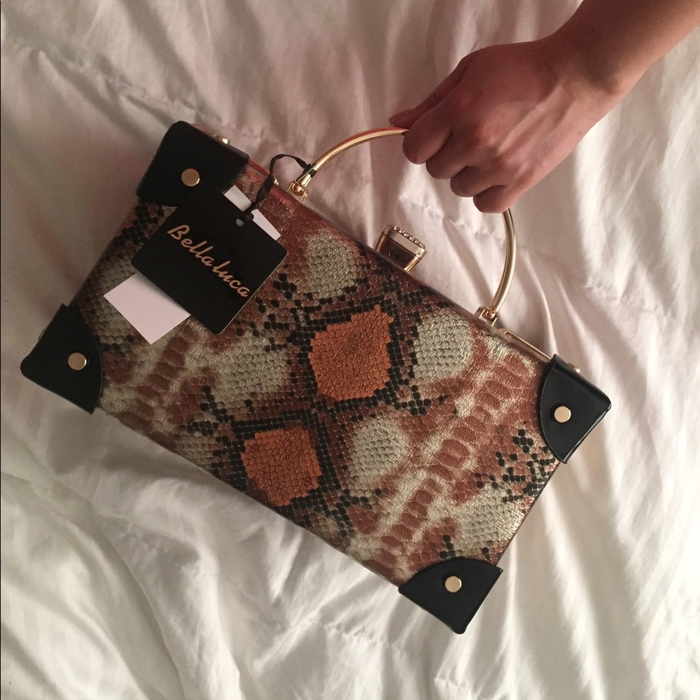 Snake print trunk purse