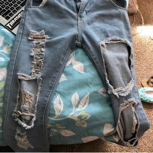 Slightly high waisted distressed skinny jean