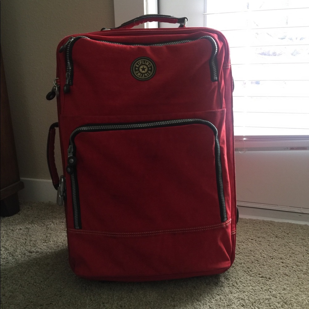 Kipling carry-on sized suitcase- have matching bag