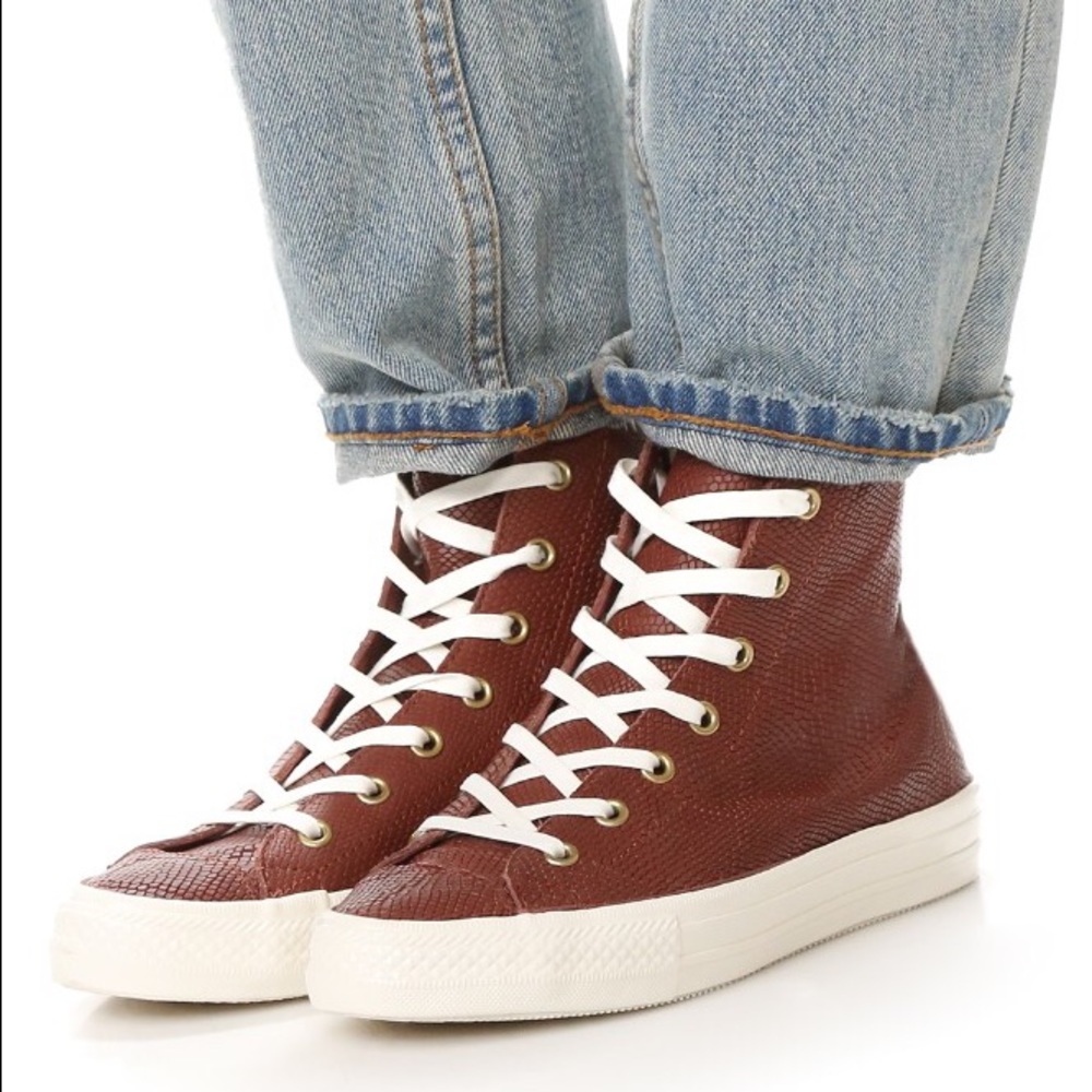 Chuck Taylor high tops embossed leather