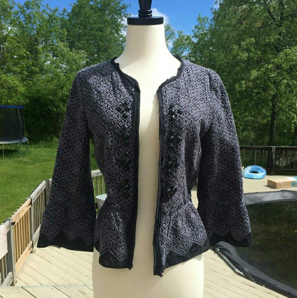 Tahari  blazer with partial peplum