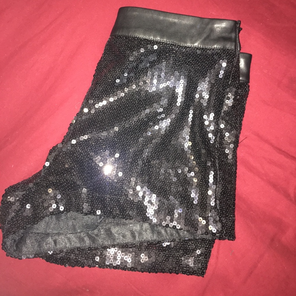 Black sequin shorts with leather waist