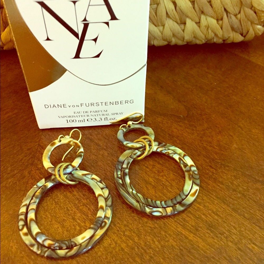 Tortoise Shell pierced earrings from Saks.