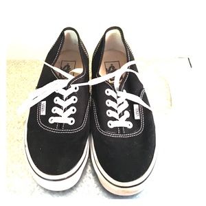Black Vans canvas sneakers