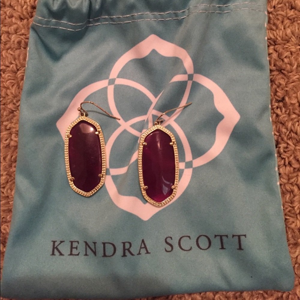 Purple Kendra Scott earrings with gold frame
