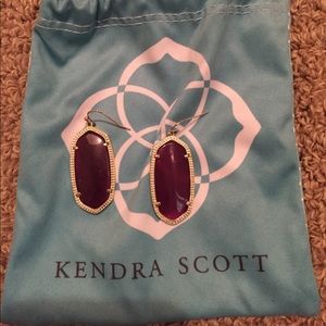 Purple Kendra Scott earrings with gold frame