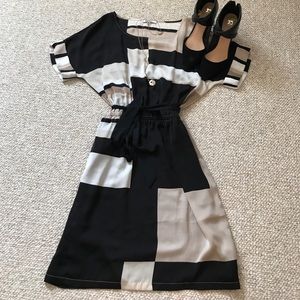 Black, cream and nude color block dress.