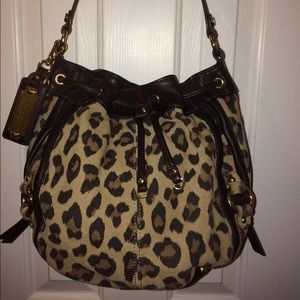 Tignanello suede cheetah drawstring bag