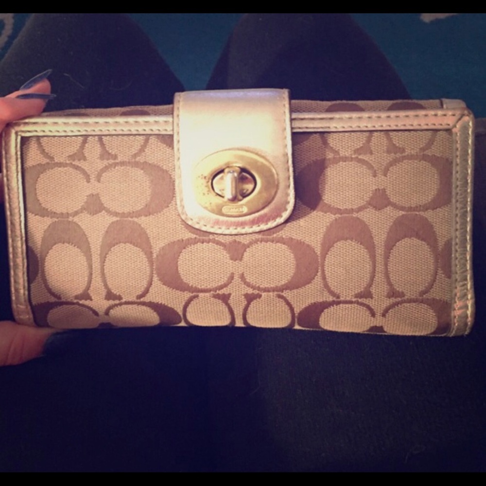 Tan Coach wallet. With Beautiful gold inside ✨