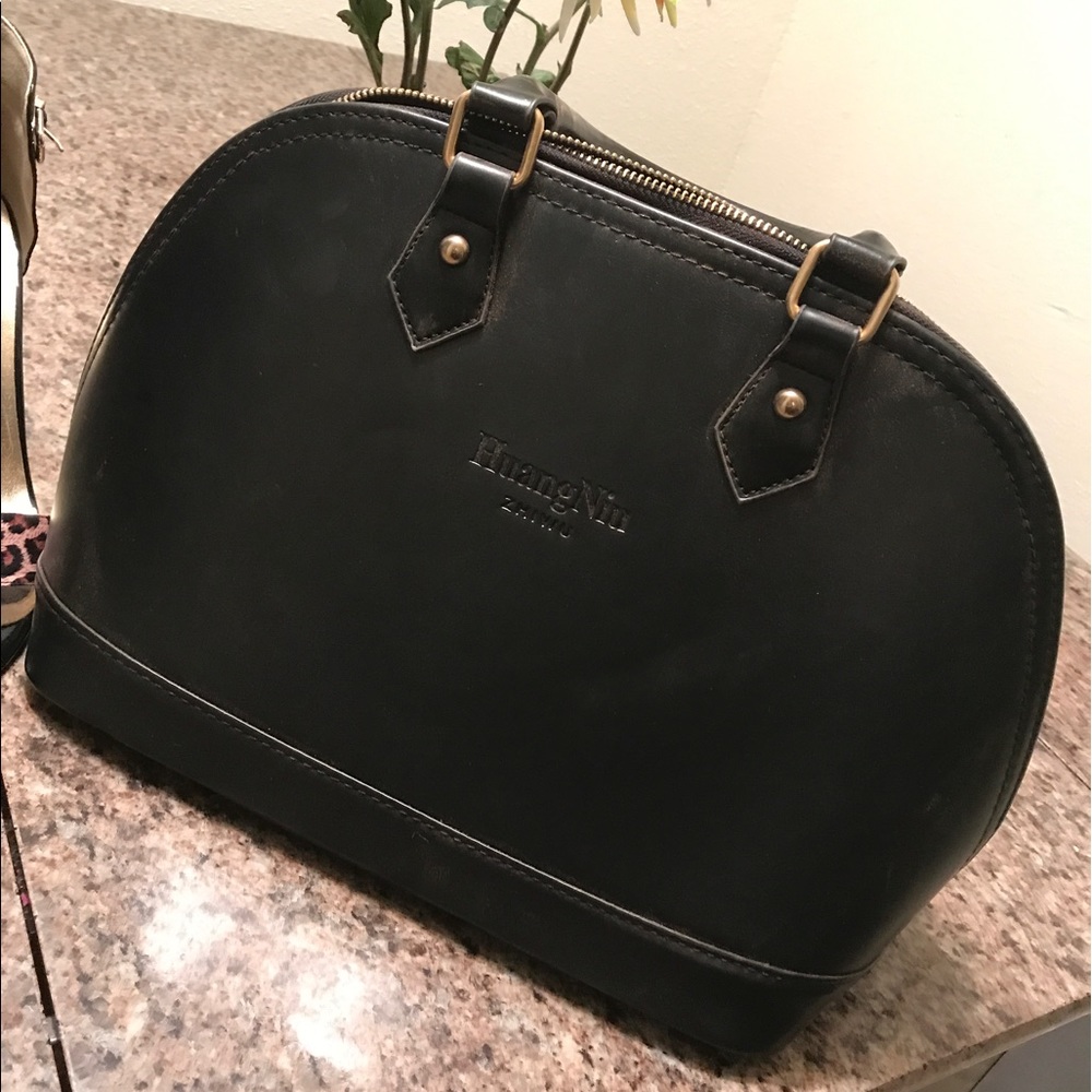 Black Leather Huang Niu bag