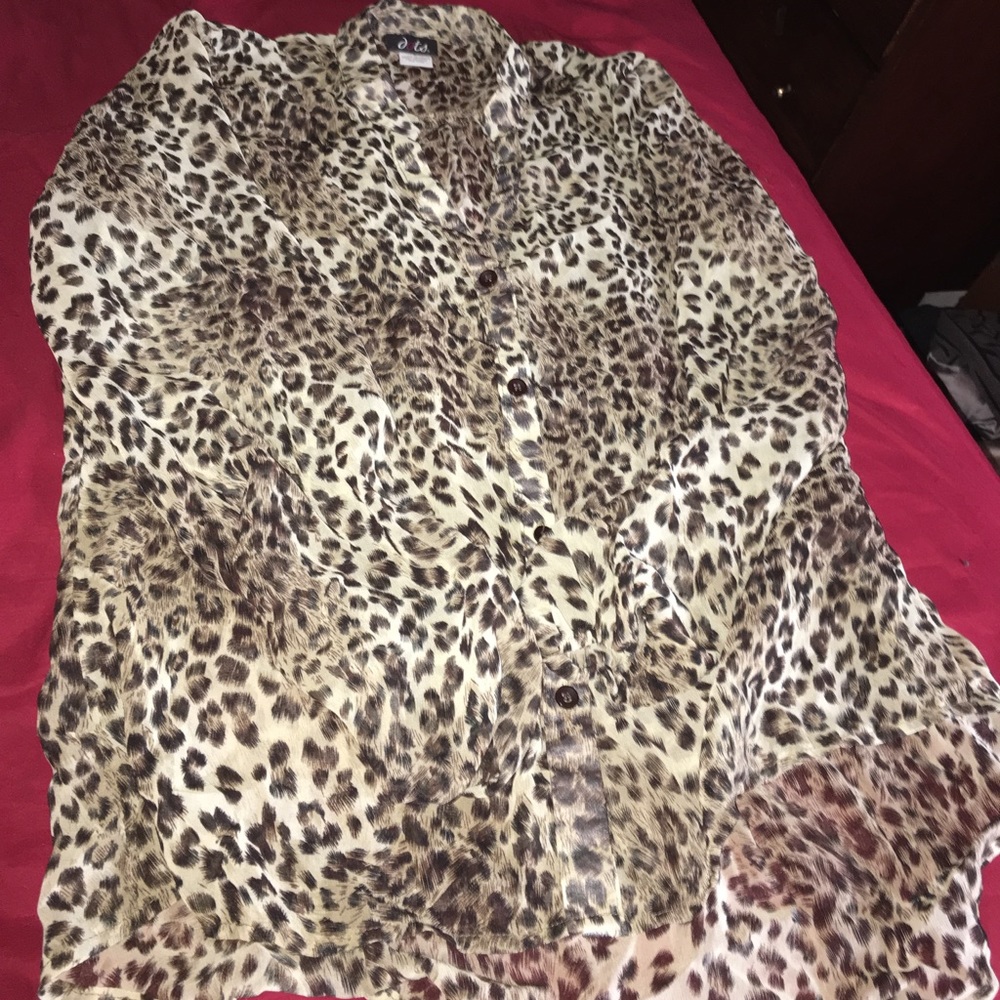 Buttoned-down sheer cheetah print top.