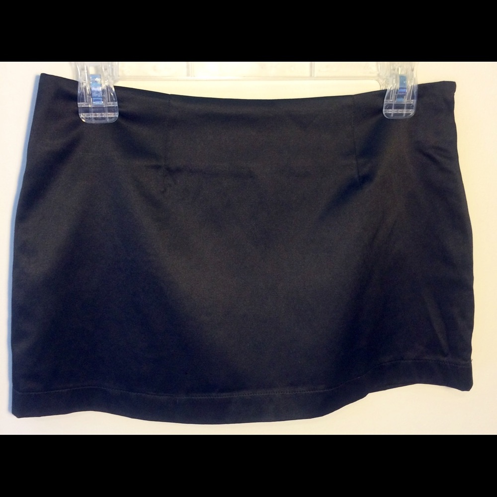 Nwt black satin mini skirt.  Size small.