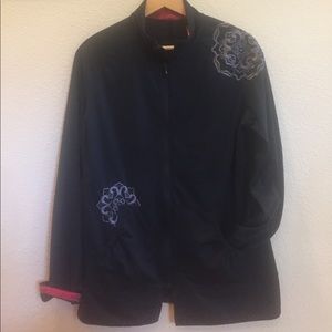 Women's REI lightweight front zip jacket.