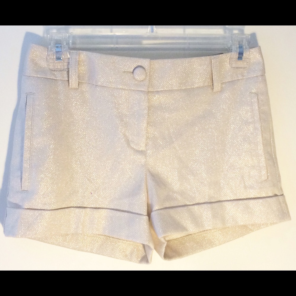 Express NWT Gold Glitter dress shorts.