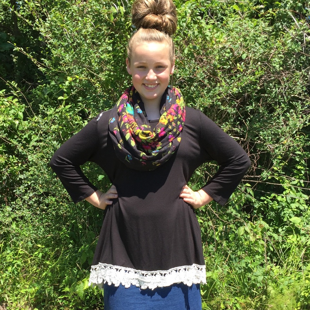 Women's black longsleeve top with lace and buttons