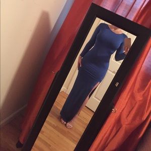 Backless blue long sleeve gown