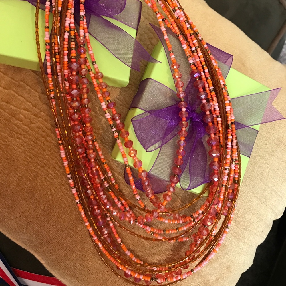 Multiple stranded beaded necklace