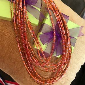 Multiple stranded beaded necklace