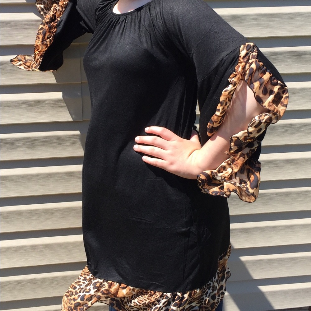 Black tunic trimmed with leopard