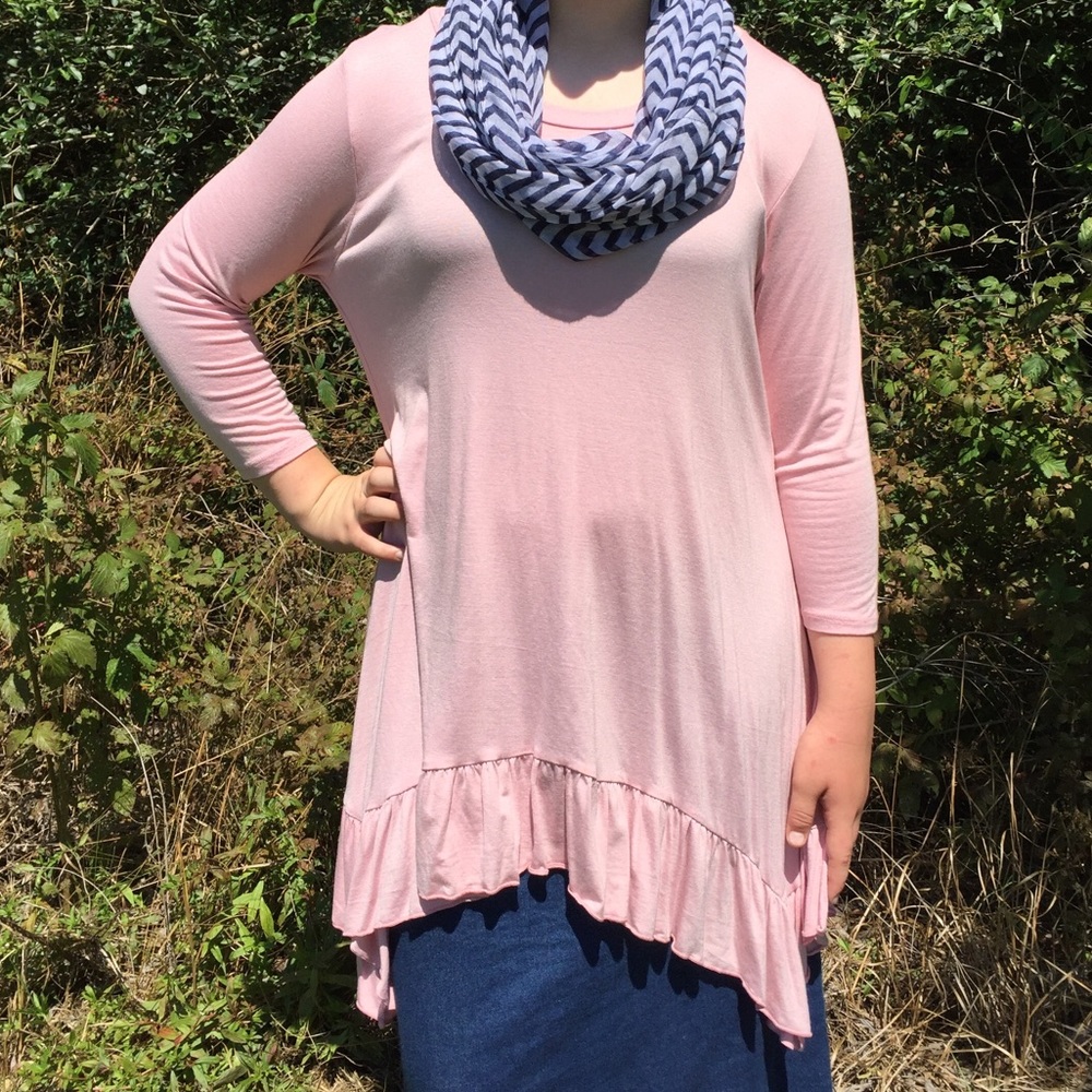 Pink Sharkbite tunic style top with ruffle