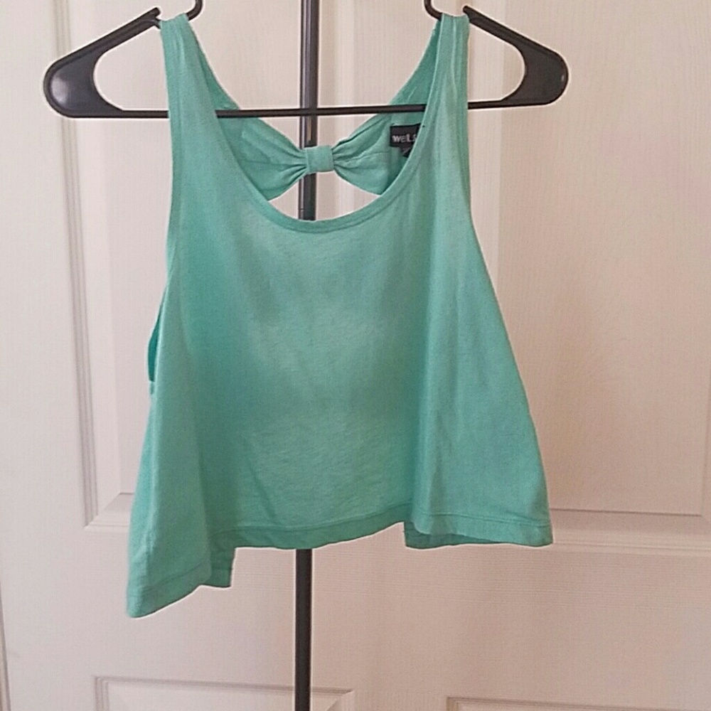 Teal tank with bows in the back