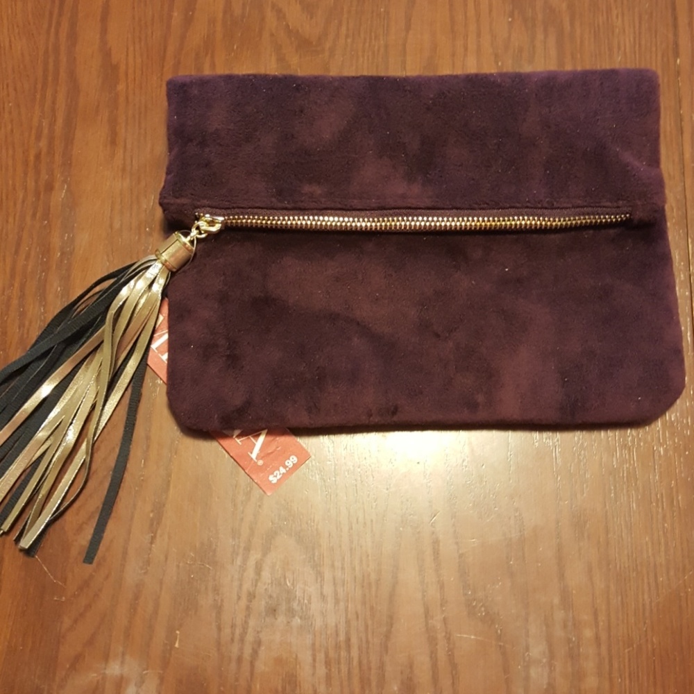Merona purple velvet fold over clutch. NWT. J3