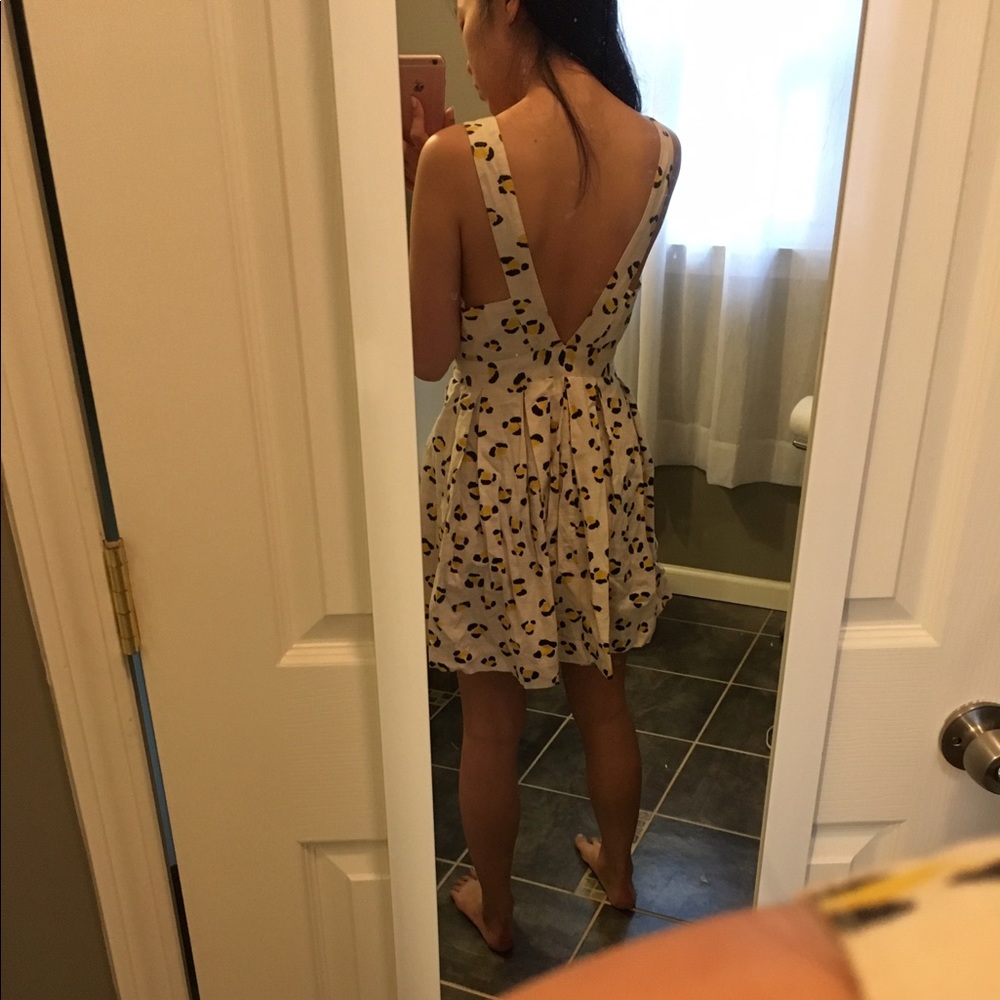 Cooperative white and yellow leaopard dress.