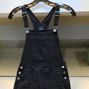 Girl's black denim overalls
