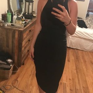 Elizabeth and James tight black evening gown.