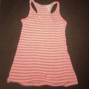 A tank top w/ creamy pink and gray striped lines.