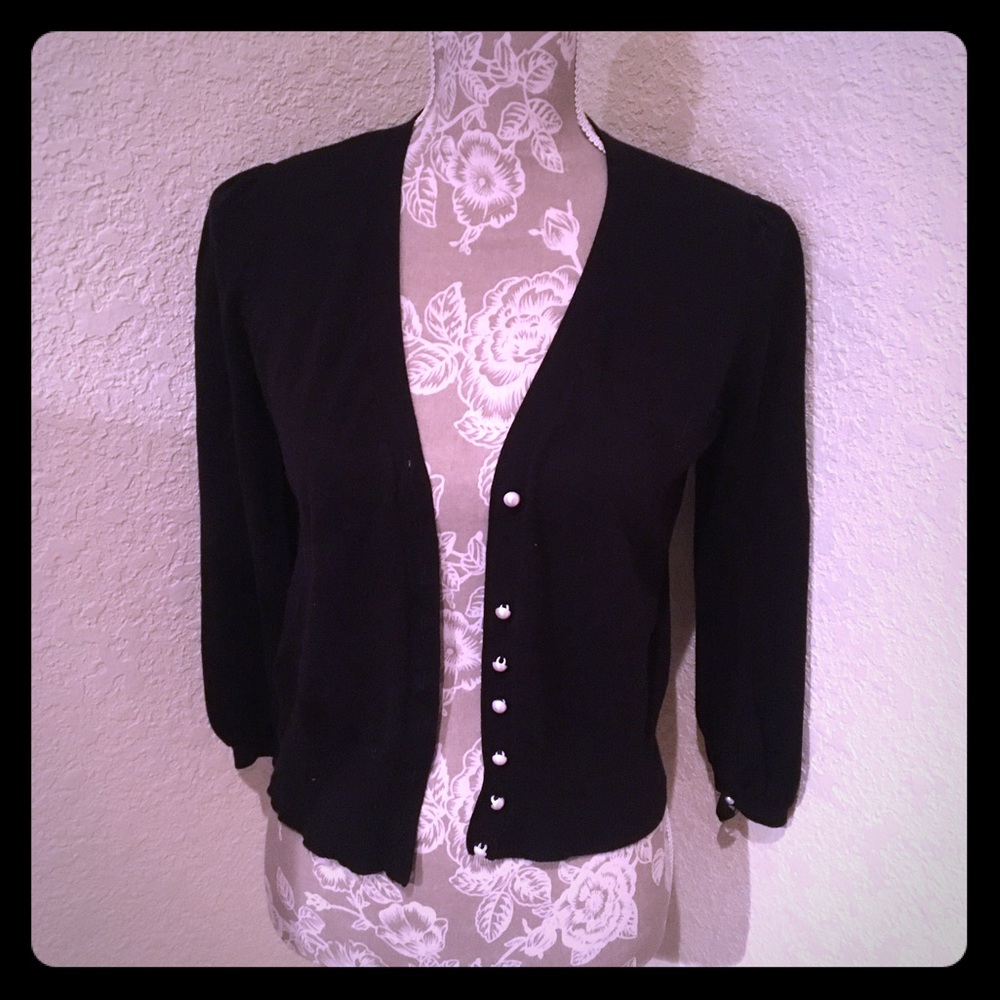 Black sweater with pearl buttons