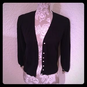 Black sweater with pearl buttons