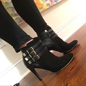 Fashionable black and gold Sam and Libby booties