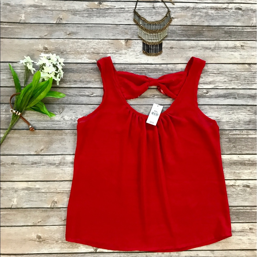 Red sleeveless back-bow sequence blouse